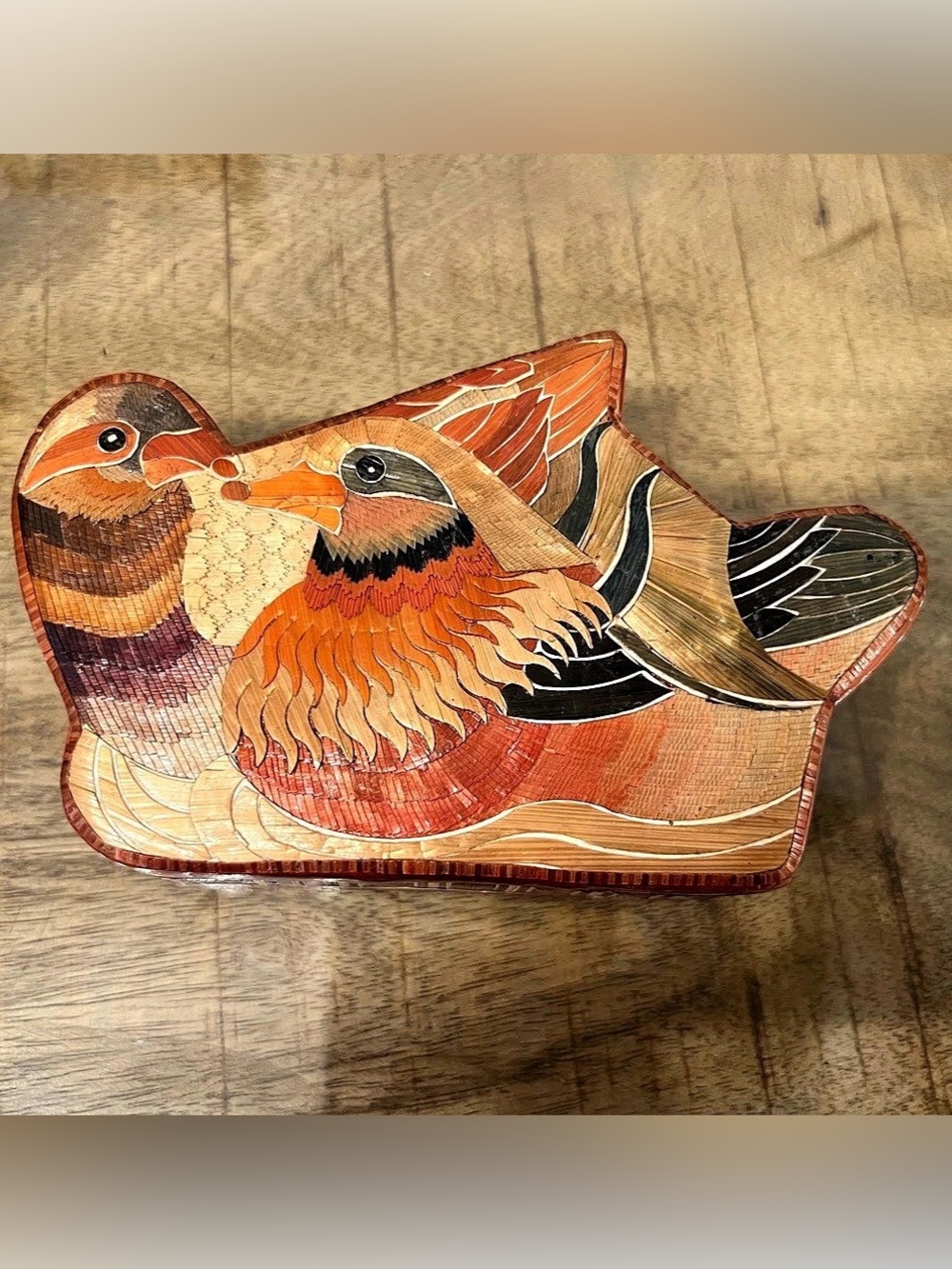 vintage wooden trinket or jewelry box featuring a straw-mosaic or straw-marquetr